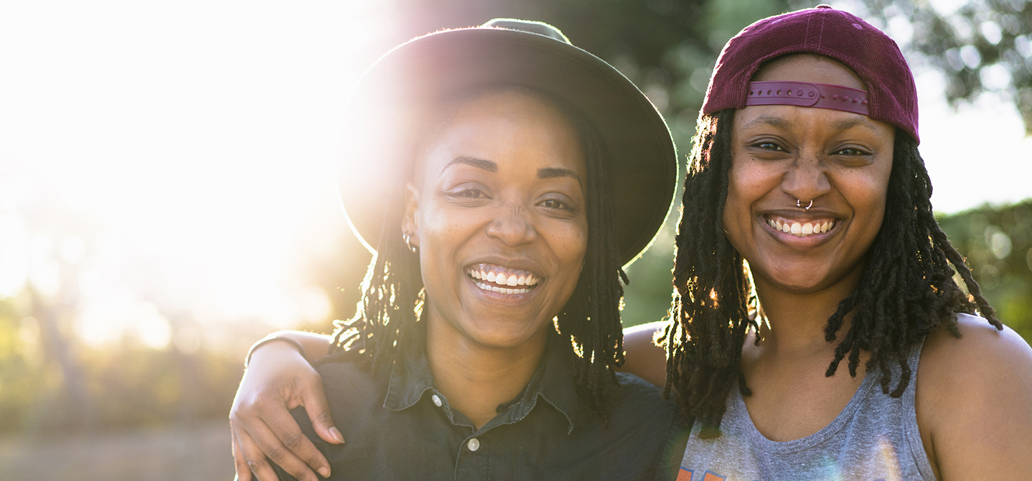 Two women smiling