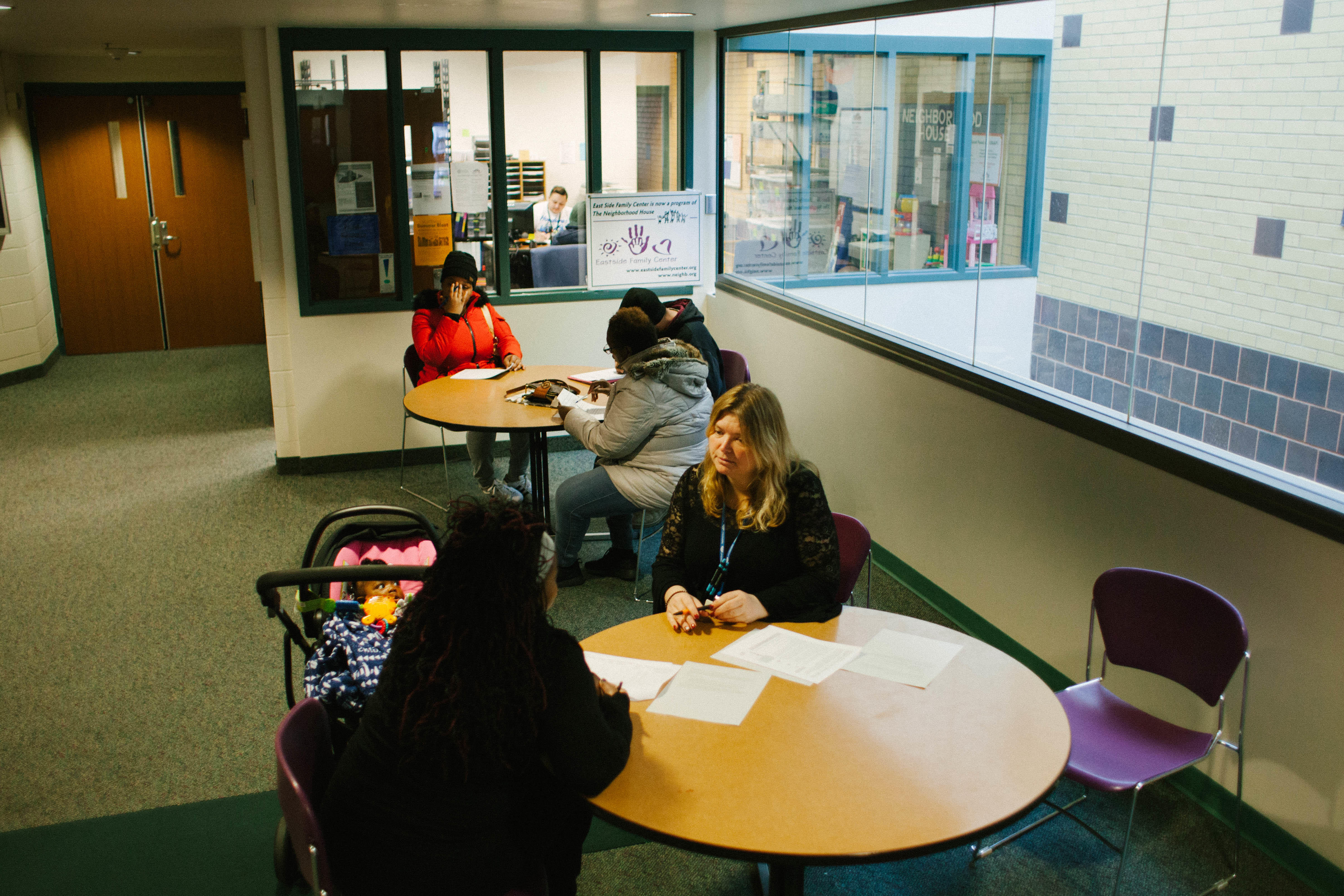 Shellie Rowe, family centers manager at Neighborhood House, meets with people at the organization’s Crisis Mornings service to help with housing and other financial challenges.