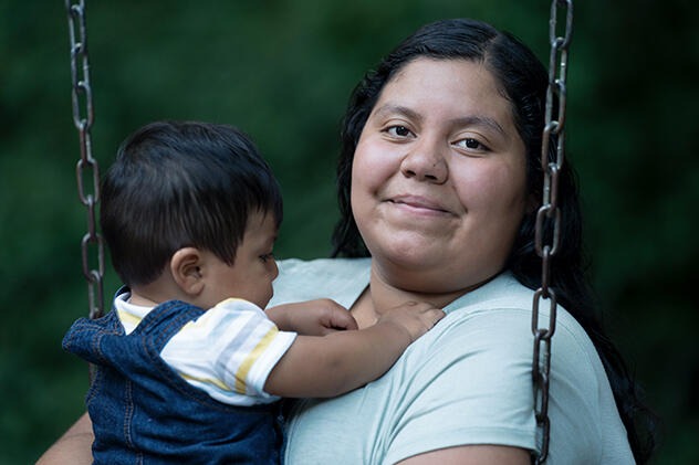 Karla Hernandez Martinez holding her son, David