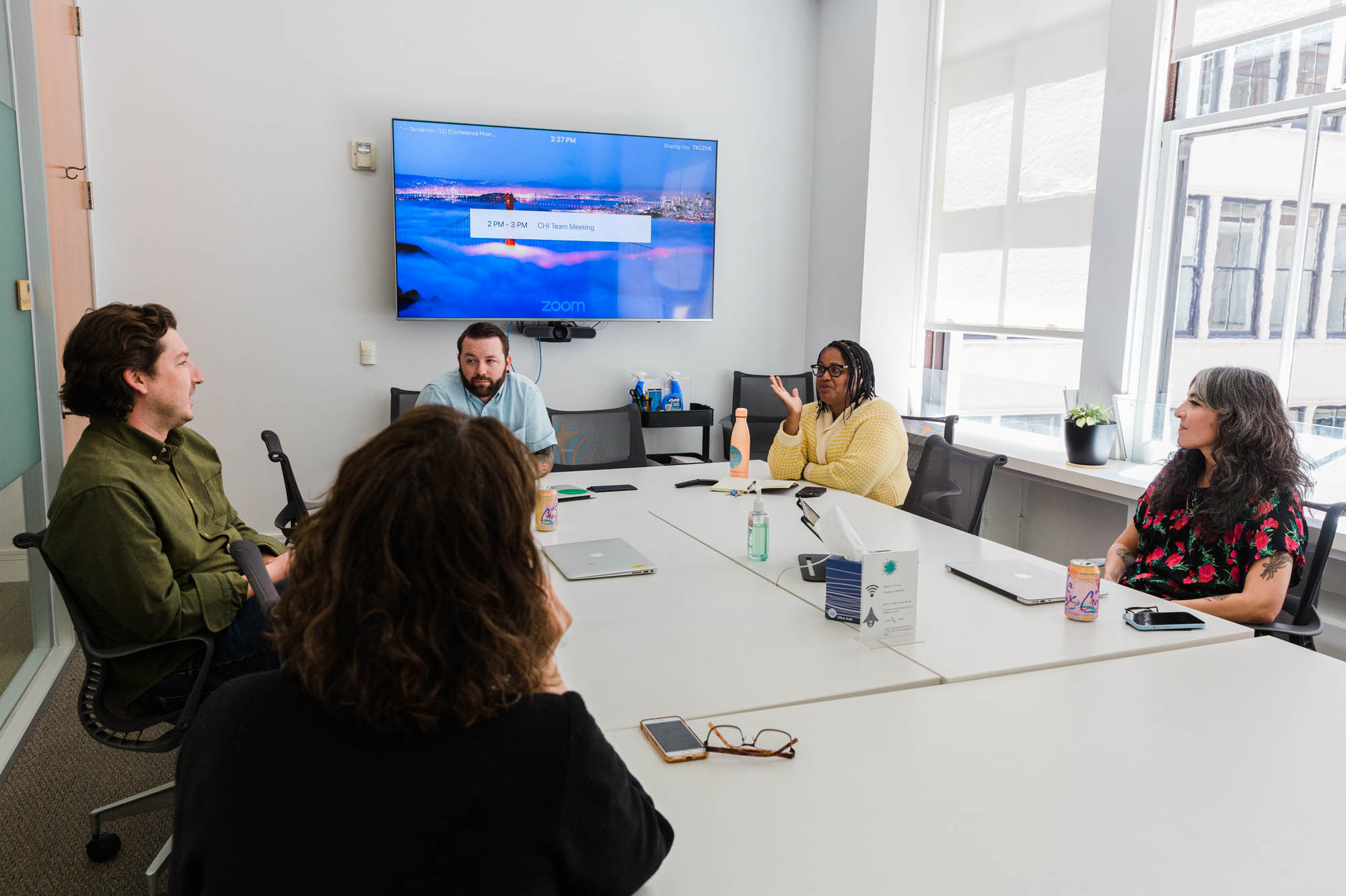 CHI staff members hold a meeting at their San Francisco office in June 2022, shortly before the five-year initiative ended. CHI was the largest private investment to address homelessness in San Francisco’s history.