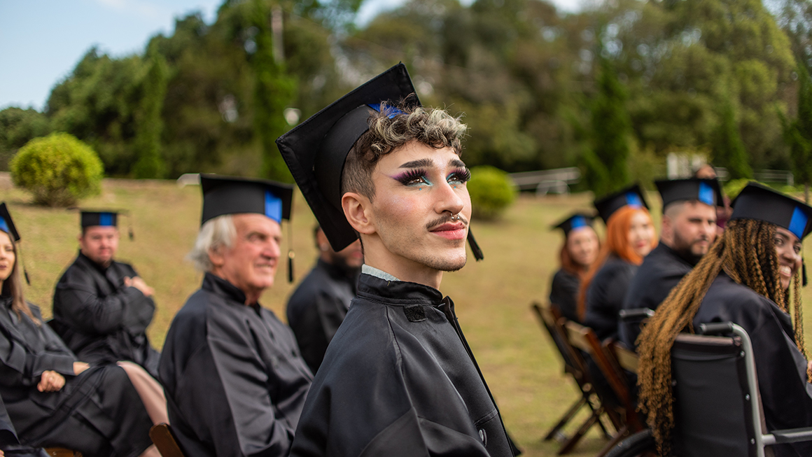 A student at a graduation ceremony. 