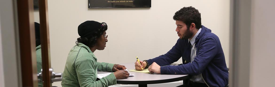photo of someone receiving financial coaching