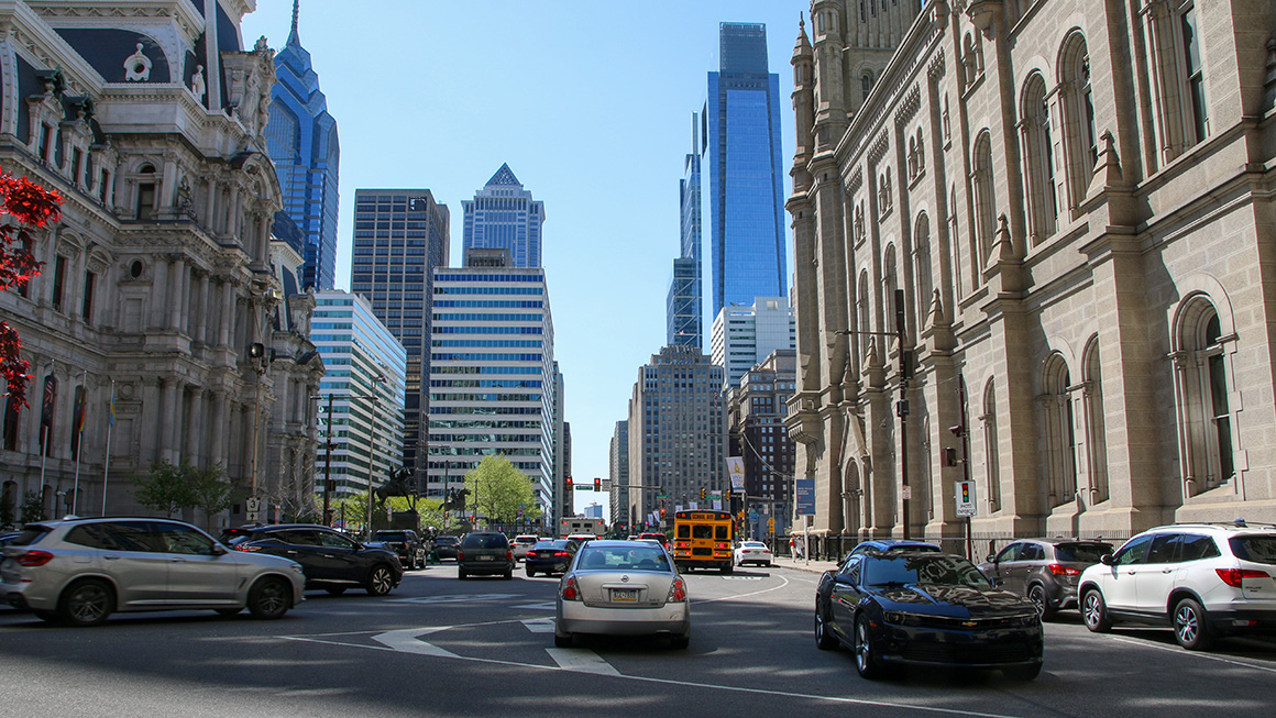 Philadelphia, Pennsylvania, USA - 29 April 2022: Cars moving around the court buildings in center City Philadelphia.