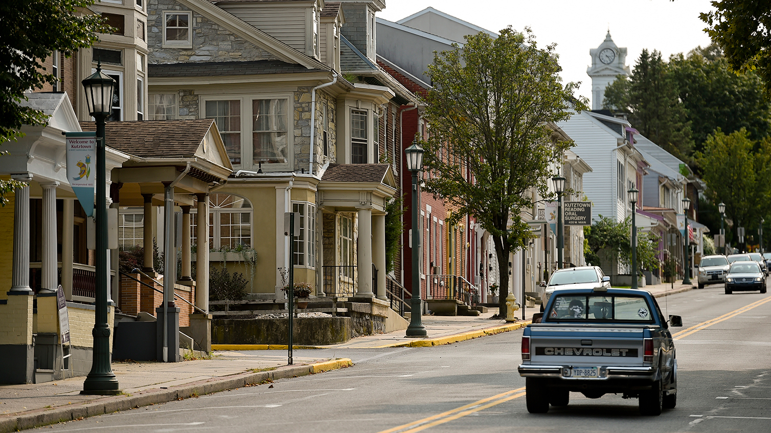 A pick up truck drives through main street in Kutztown, Pennsylvania.