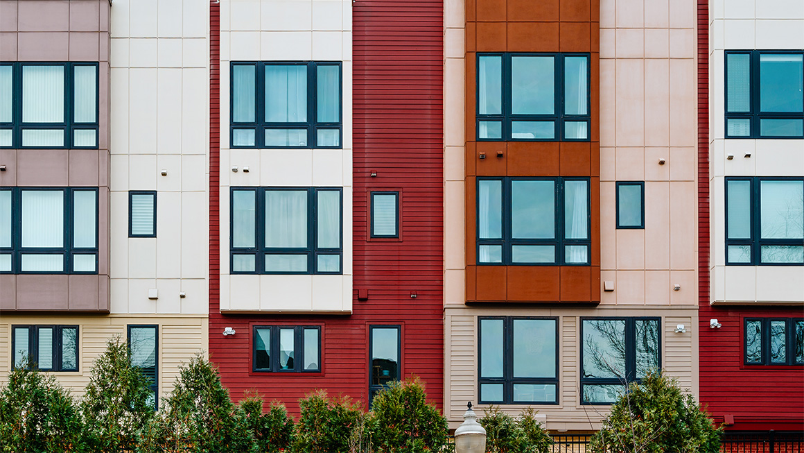 Photo of colorful multi-family housing. 