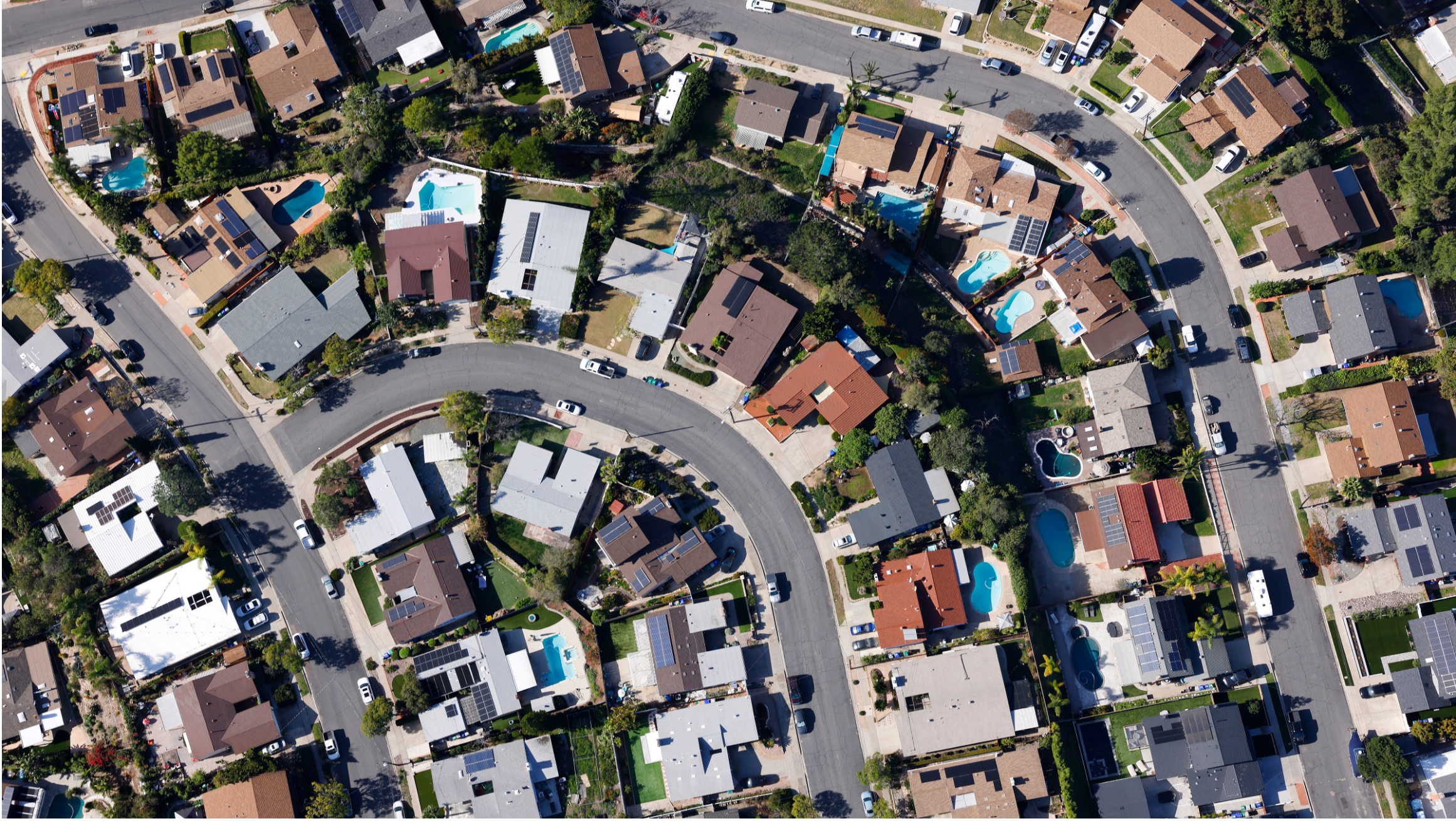 An aerial view of a single-family home neighborhood