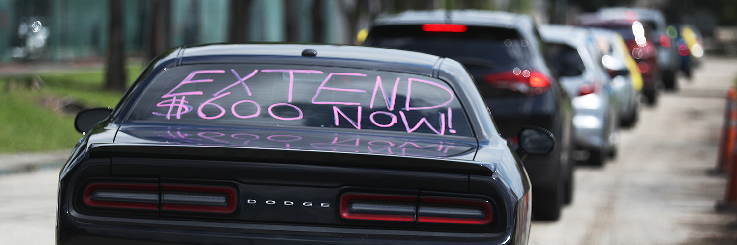 Car with "Extend $600 Now" sign on its rear window