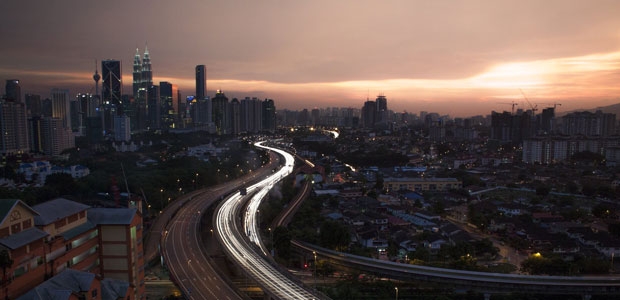 city skyline with highway
