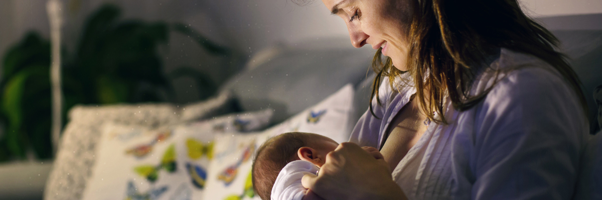 Mother nursing baby