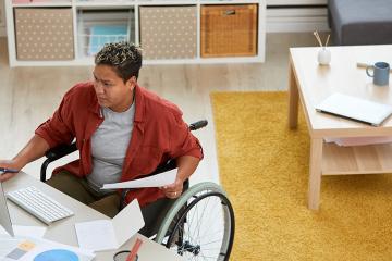 Disabled businesswoman at office