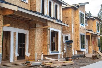 Wood townhouse building under construction