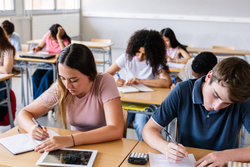 photo of students in classroom working at their desks