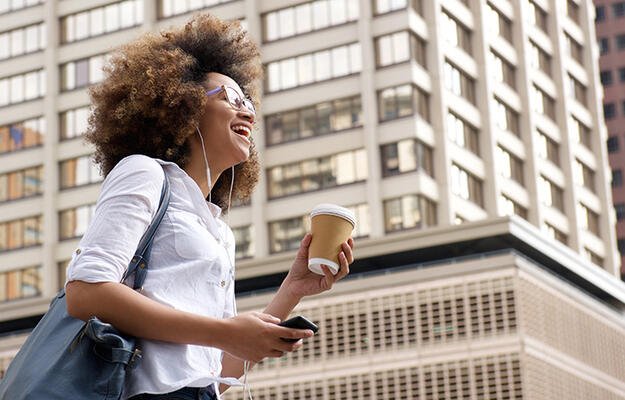 Woman walks down street
