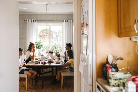 A family sharing a meal together at home.
