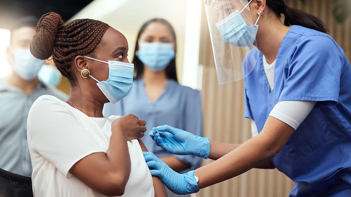 Person receiving vaccine shot