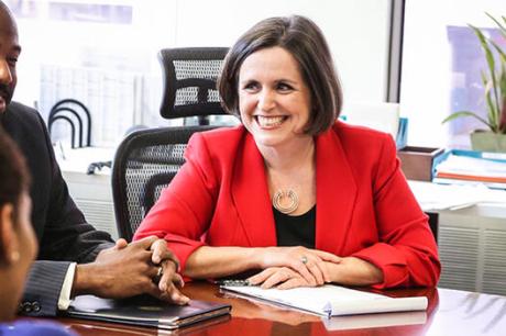 Urban Institute president Sarah Wartell with staff