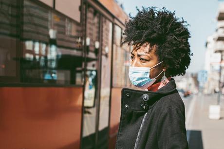 African American woman wearing a mask