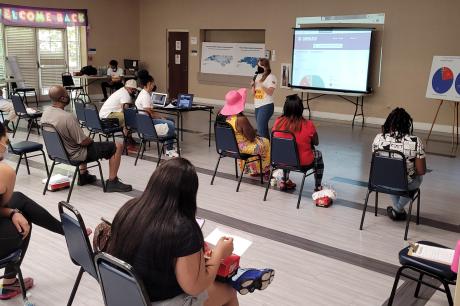 A Forward Justice representative leading a presentation