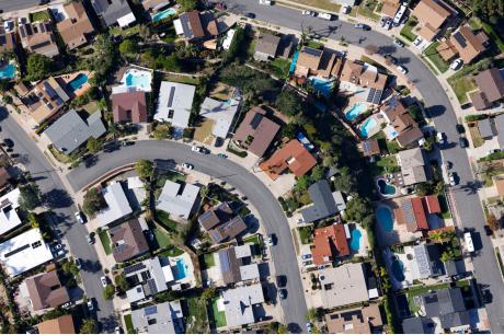 An aerial view of a single-family home neighborhood