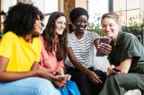 photo of women sitting together