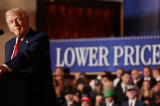 President Trump gives a speech in front of a sign that says “Lower Prices.”