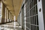 Image of an empty hallway in a prison