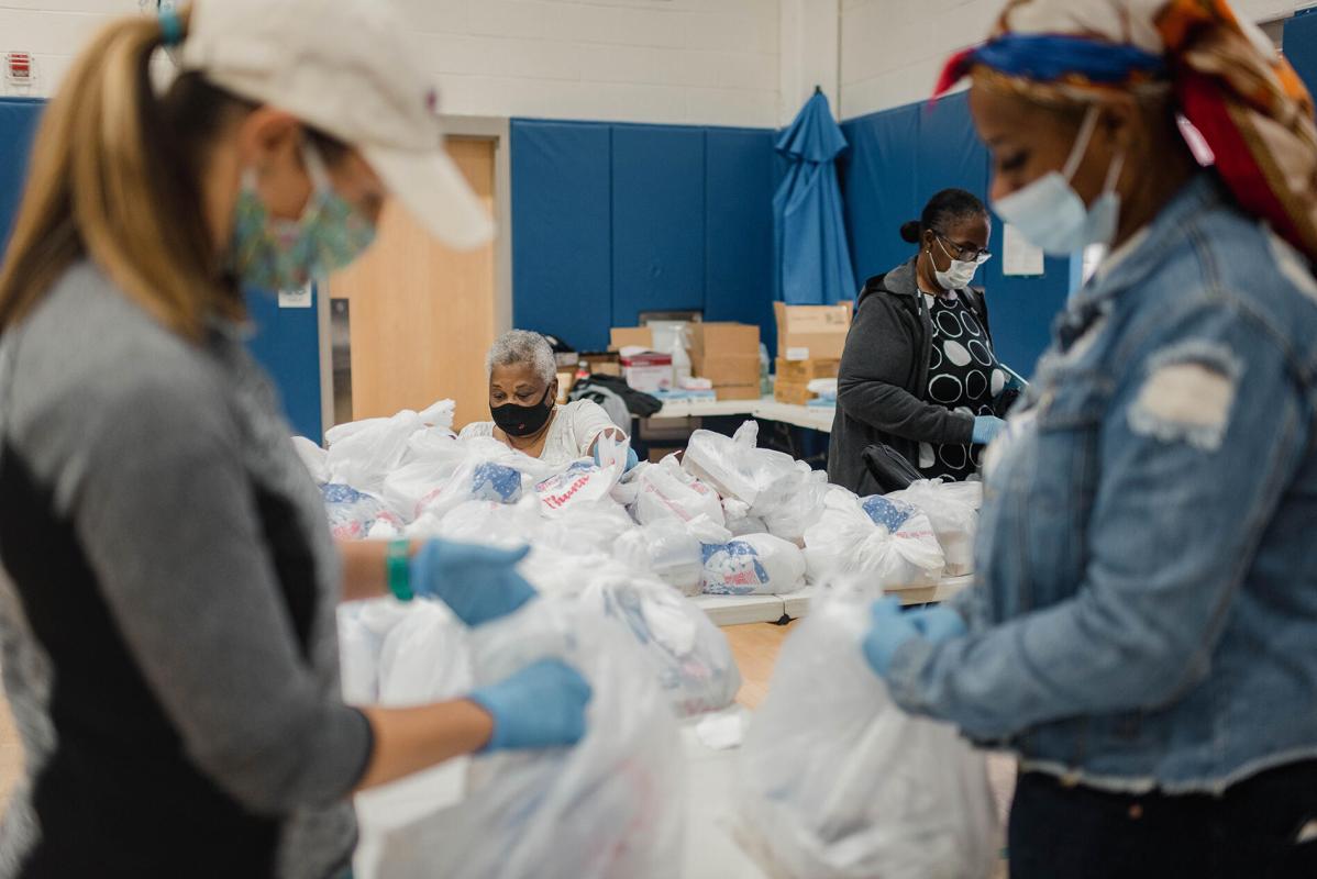 Camden Promise Neighborhood works with KIPP Cooper Norcross Academy and other local partners to organize the Hope Mobile food distribution